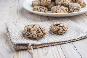 Oat and peanut butter cookies with pumpkin seeds and cinnamon