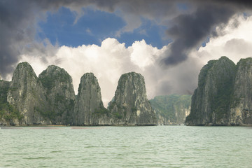 Fototapeta na wymiar Halong Bay with storm cloud, Vietnam, Southeast Asia.