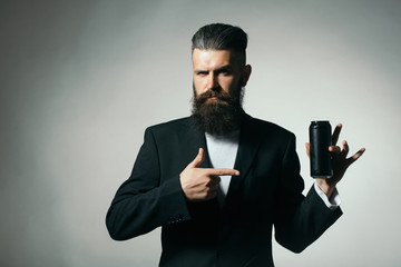 Bearded man with beer tin can