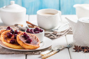 Cottage cheese pancakes with cherry sauce