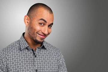 Close up portrait of a handsome young man smiling