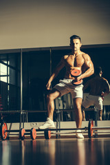 muscular man with barbell