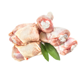 RAW CHICKEN LEGS AND BREAST with sage  ISOLATED ON WHITE