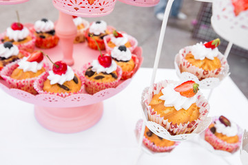 wedding cupcakes in iron baskets