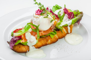 Sandwich with salmon isolated on white background