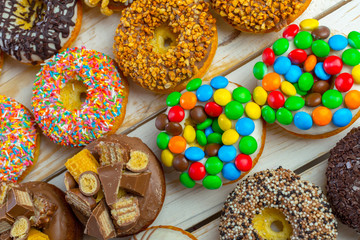 Donut. Sweet icing sugar food. Dessert colorful snack.