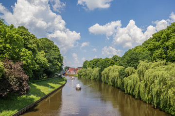 Fototapeta na wymiar Boats on the river Ems in Meppen