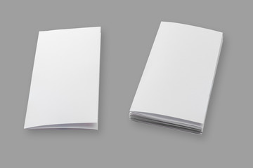 blank brochure paper on wood background,with clipping path