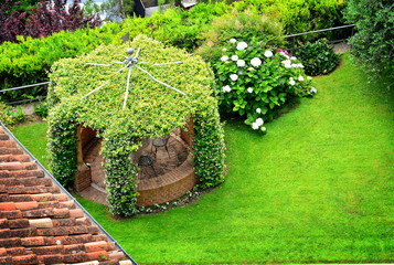 The gazebo in the house garden. - 113882017