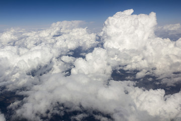 Naklejka na ściany i meble clouds from airplane window