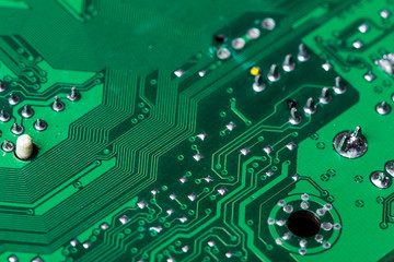 Close up of a printed green computer circuit board