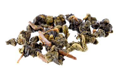 Heap of dry green tea  on white background