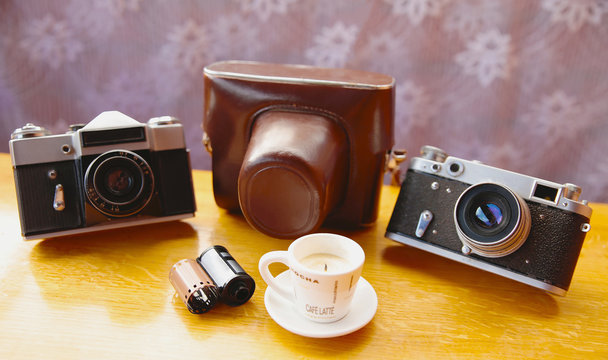 Vintage camera on wooden table