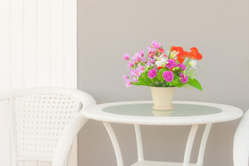 Decorative plastic flowers on household furnitures
