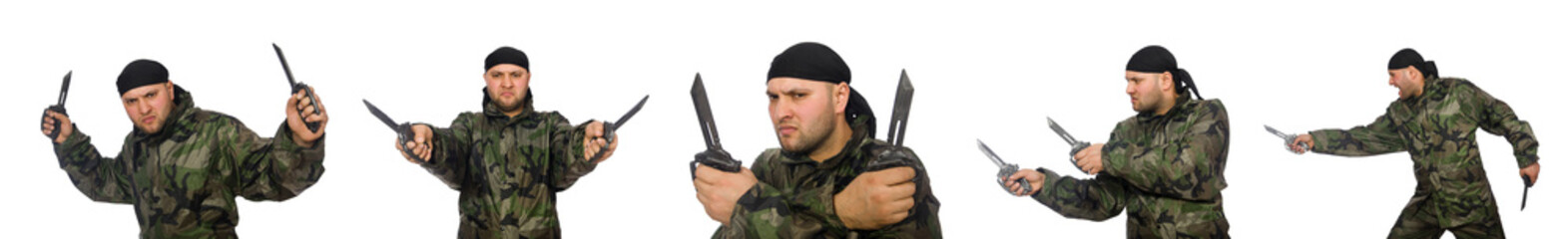 Young man in soldier uniform holding knife isolated on white