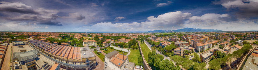 Fototapeta na wymiar Aerial view of Pisa, North-Western district from helicopter at d