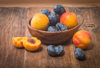 Summer fruits - plums and apricots
