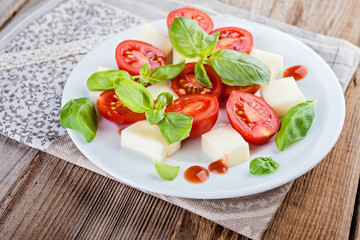 Vegetable salad  on wooden background.