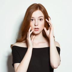 The young red-haired girl