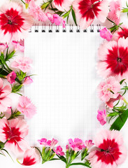 Notebook with flowers carnation on white background. Love concep