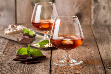 Vintage cognac still life with chocolate