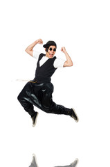 Fototapeta na wymiar Funny young man dancing isolated on white