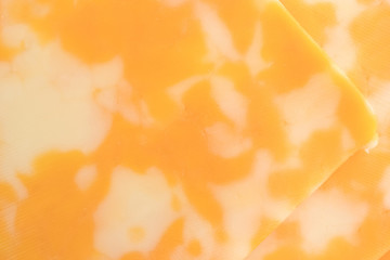 Close view of Colby-Jack cheese slices.