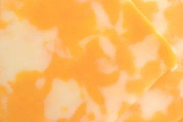 Crédence de cuisine en verre imprimé Produits laitiers Close view of Colby-Jack cheese slices.