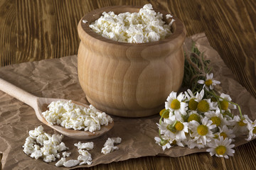 Cottage cheese and chamomile flowers