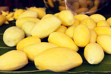 peeled mango at street market