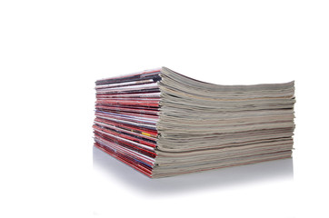 Stack of magazine isolated on the white background
