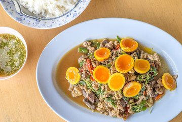 Stirred with Basil Leaves chicken with innards hot and spicy delicious Thai food.