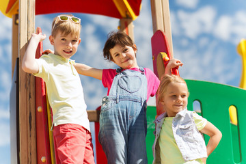 Fototapeta na wymiar group of happy kids on children playground