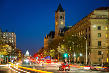 Obraz premium Pennsylvania Avenue, Old post building and Capitol at night, Washington DC, USA