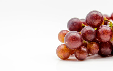 fresh red grapes fruit isolate on white background, it mean for weight loss, diet, eat clean, healthy. Selective focus