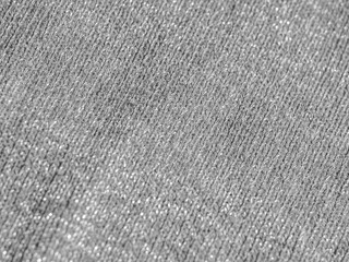 Fototapeta na wymiar Abstract black and white blurry knitting fabric pattern