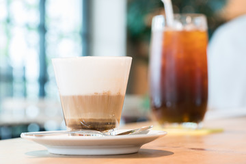 a cup of expresso macchiato.
