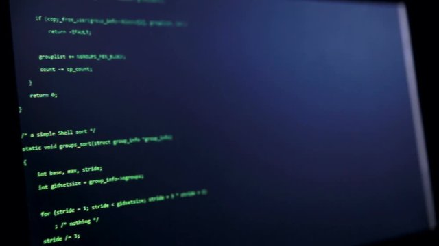 Programming code for steal money running down on a hackers computer screen. HD.