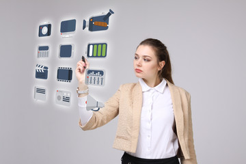 Woman pressing multimedia and entertainment icons on a virtual background