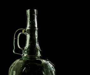 glass bottle, empty, original, on black background