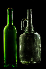 glass bottle, empty, original, on black background