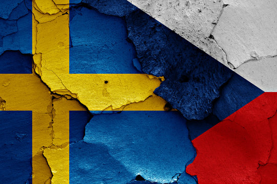 flags of Sweden and Czechia painted on cracked wall