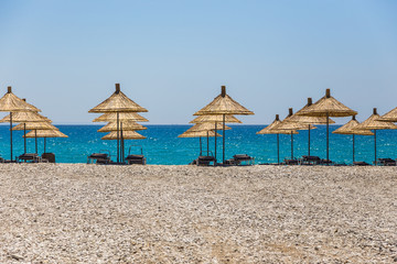 Umbrellas on the beach in Albania.