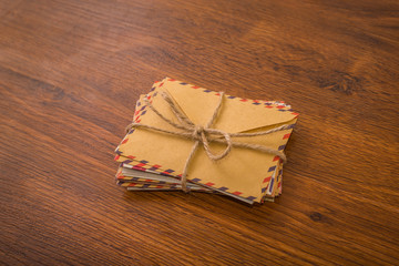 Bundle envelopes on a wood table