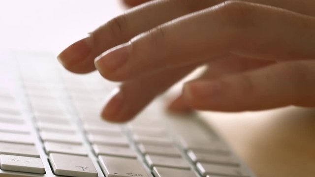 Woman hands on keyboard