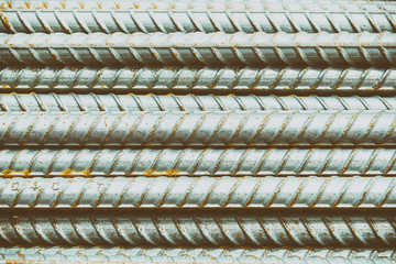 The deform bar,the deform bar pile on the construction site with the rusty in vintage scene.The steel bar pile with the rusty in classic scene.Close up of the steel bar with the rusty in vintage scene