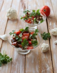 Panna Cotta with cauliflower salad with tomato and basil