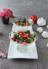 Panna Cotta with cauliflower salad with tomato and basil