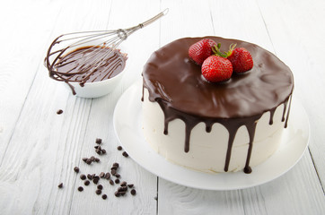 The process of making chocolate Cake filled with glaze. Birds milk.