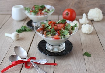 Panna Cotta with cauliflower salad with tomato and basil